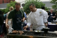 Chef Teddy Folkman helps grill